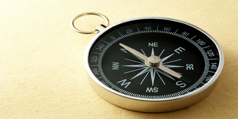compass-on-gold-background