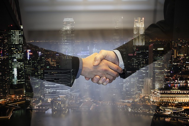 handshake to secure a contract deal feature