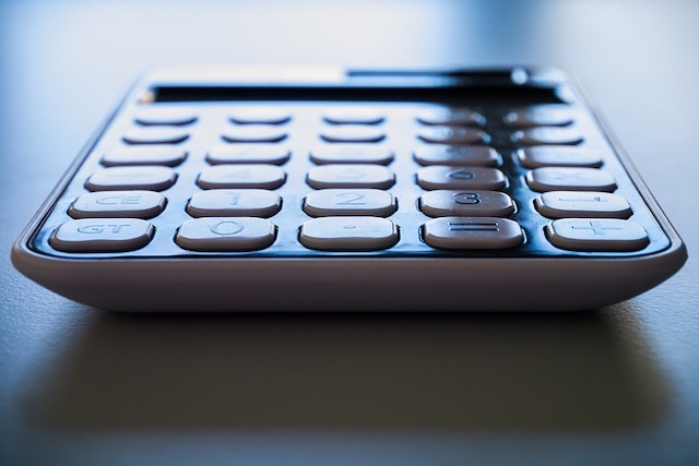 image of calculator to signify calculating redundancy when a company goes into administration feature