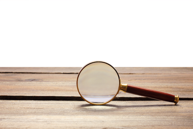 magnifying-glass-things-to-keep-eye-on-business-valuation-report-FEATURE