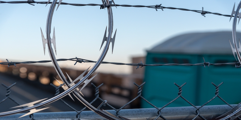 razor-wire-fence-prison-directors-negligence-consequences