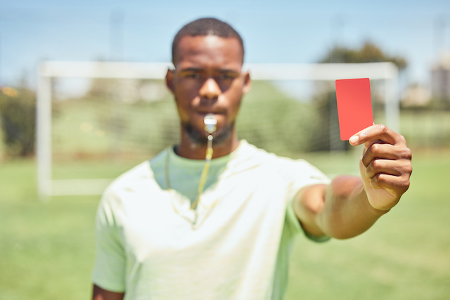 referee-showing-red-card-representing-what-is-the-penalty-for-late-payment-of-corporation-tax-FEATURE