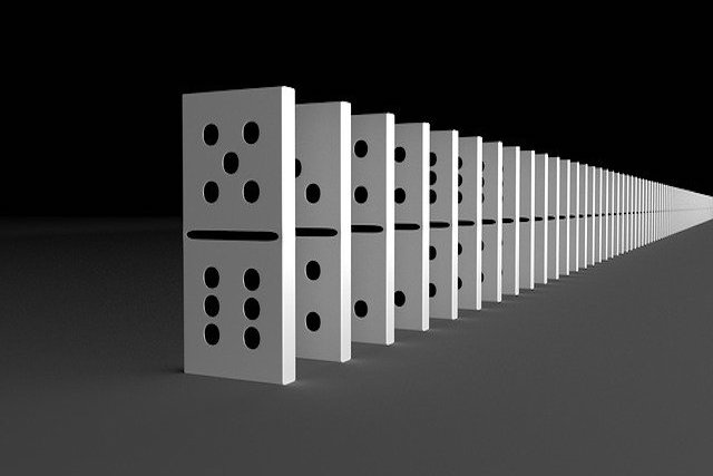 set of dominoes to illustrate the impact of company voluntary arrangement procedures feature