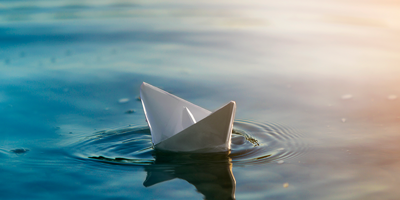 white-oragami-boat-sinking-immediate-action-solve-cash-flow-problems